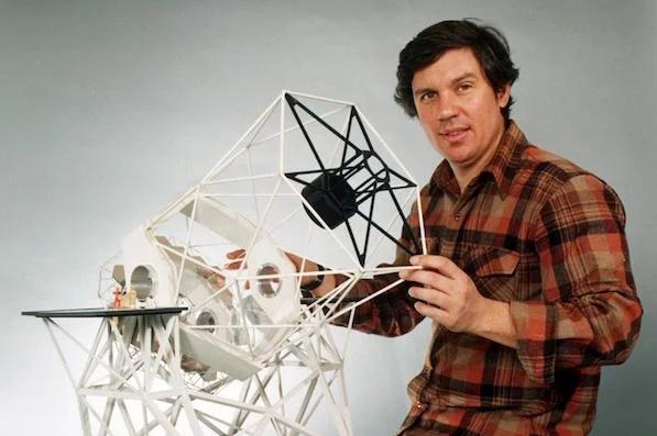 Nelson with a model of the Keck telescope. Credit: W. M. Keck Observatory